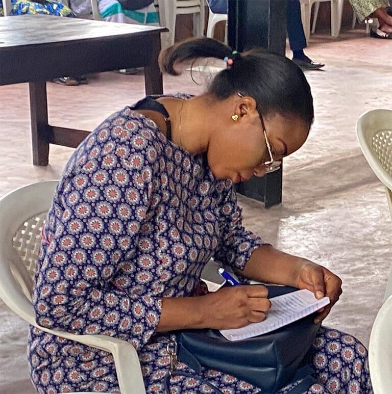 Woman taking notes